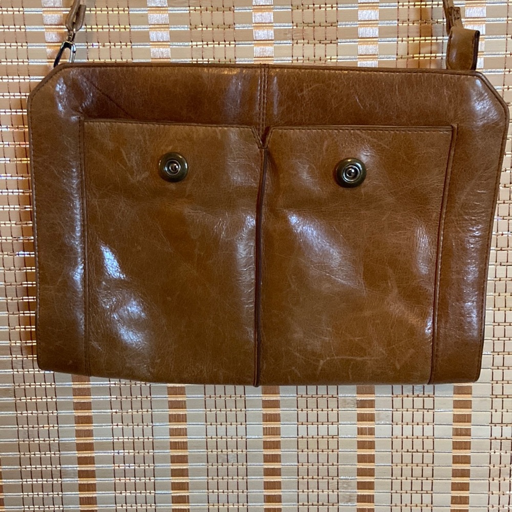 HOBO brand purse.  11” x 8” with long thin strap.  Pre owned—great condition!